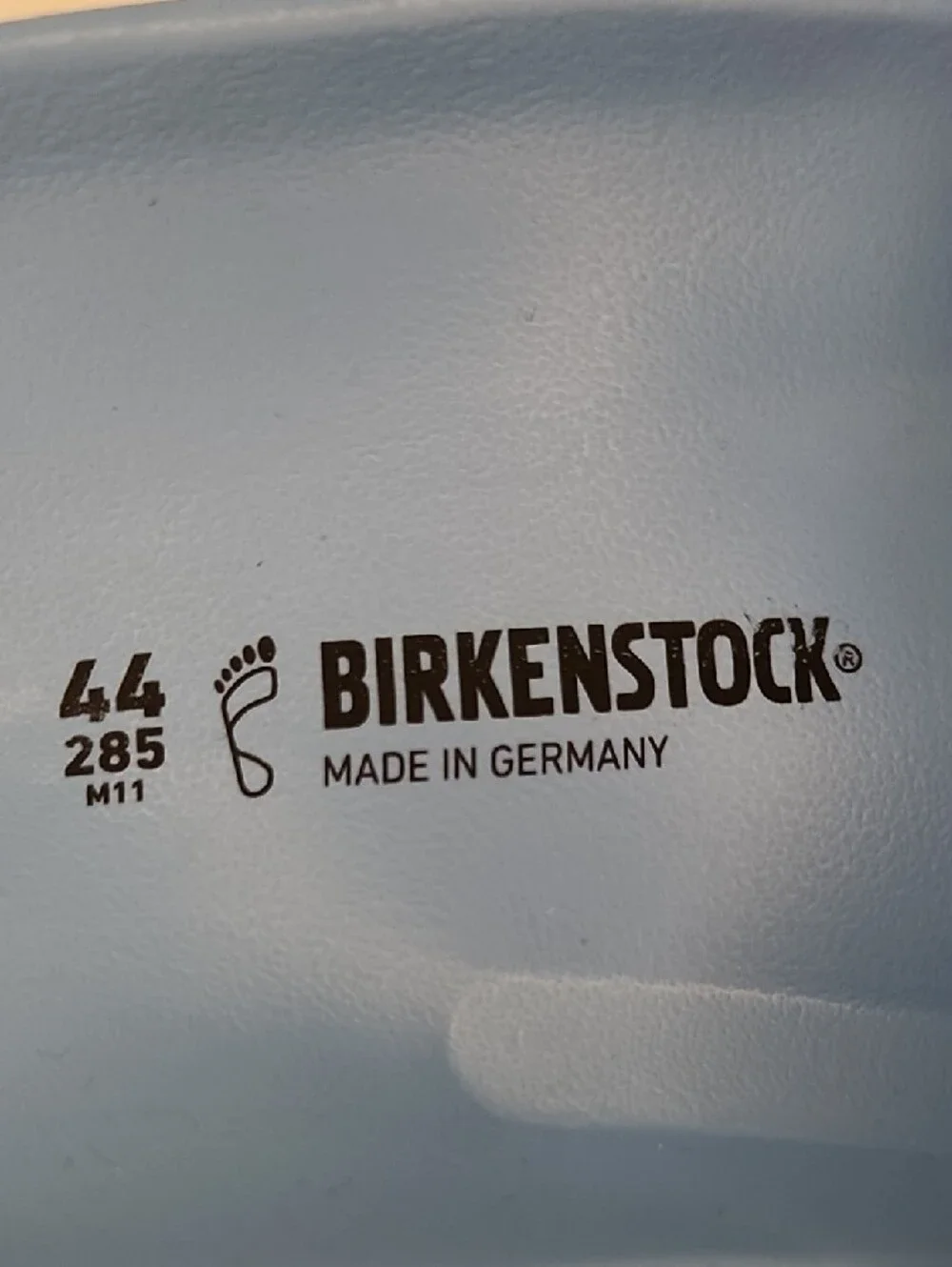Birkenstock Light Blue Slide Sandals with Embossed Strap